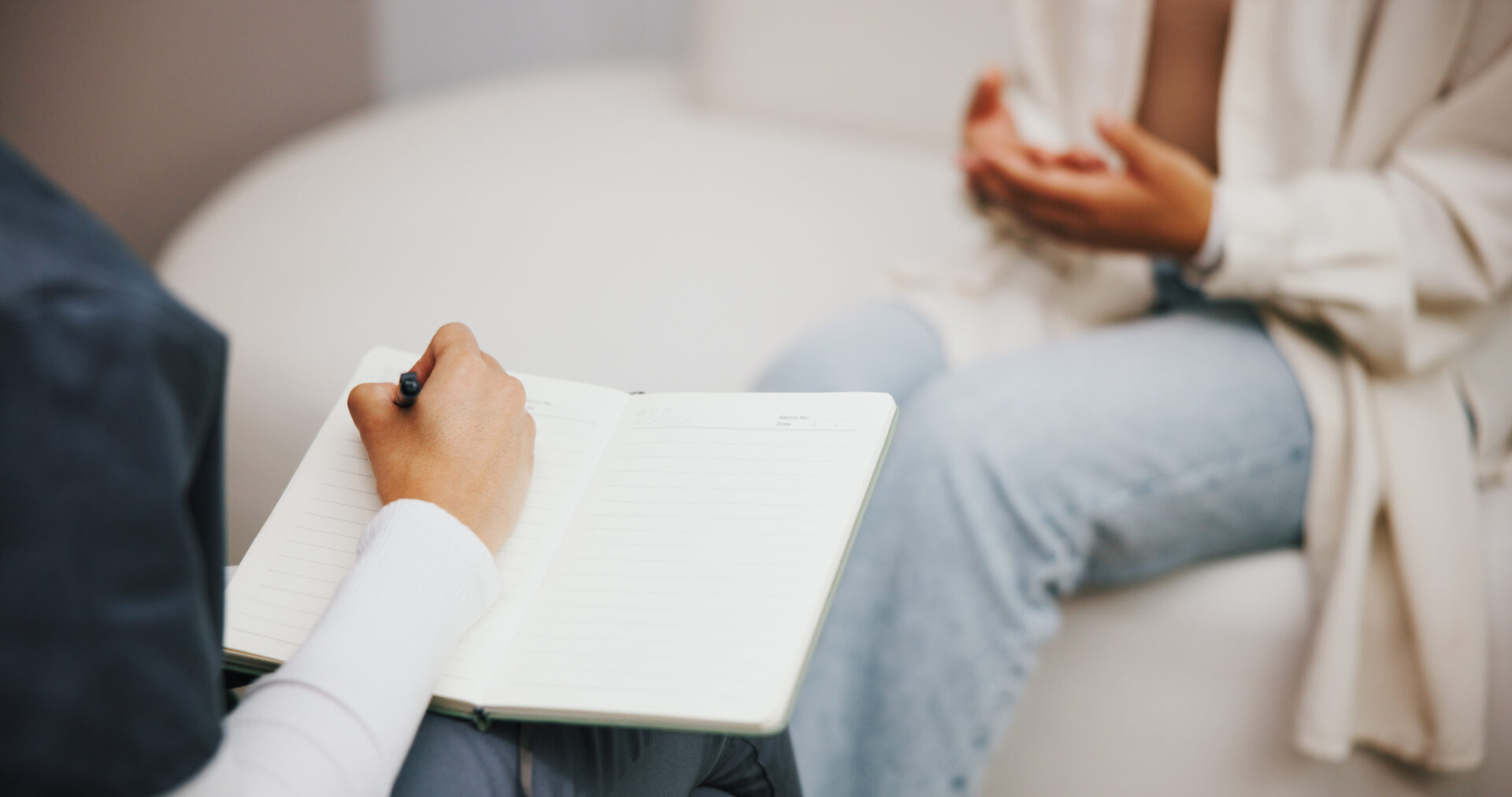Psychologist, writing and patient with anxiety, hands and help for sharing of trauma and counselling. Appointment, therapist and notes for evaluation in clinic, people and consultation for grief